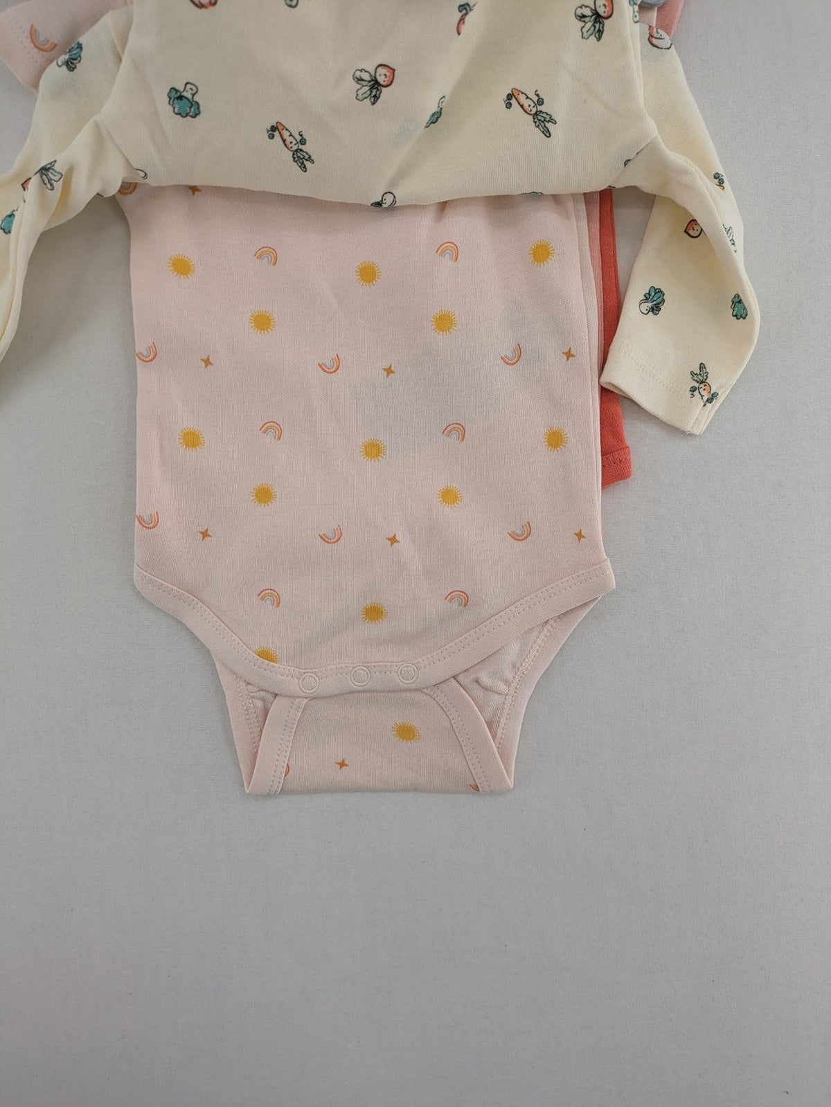 Ergee baby bodysuits set blue cream orange various cute patterns and wrap design.
