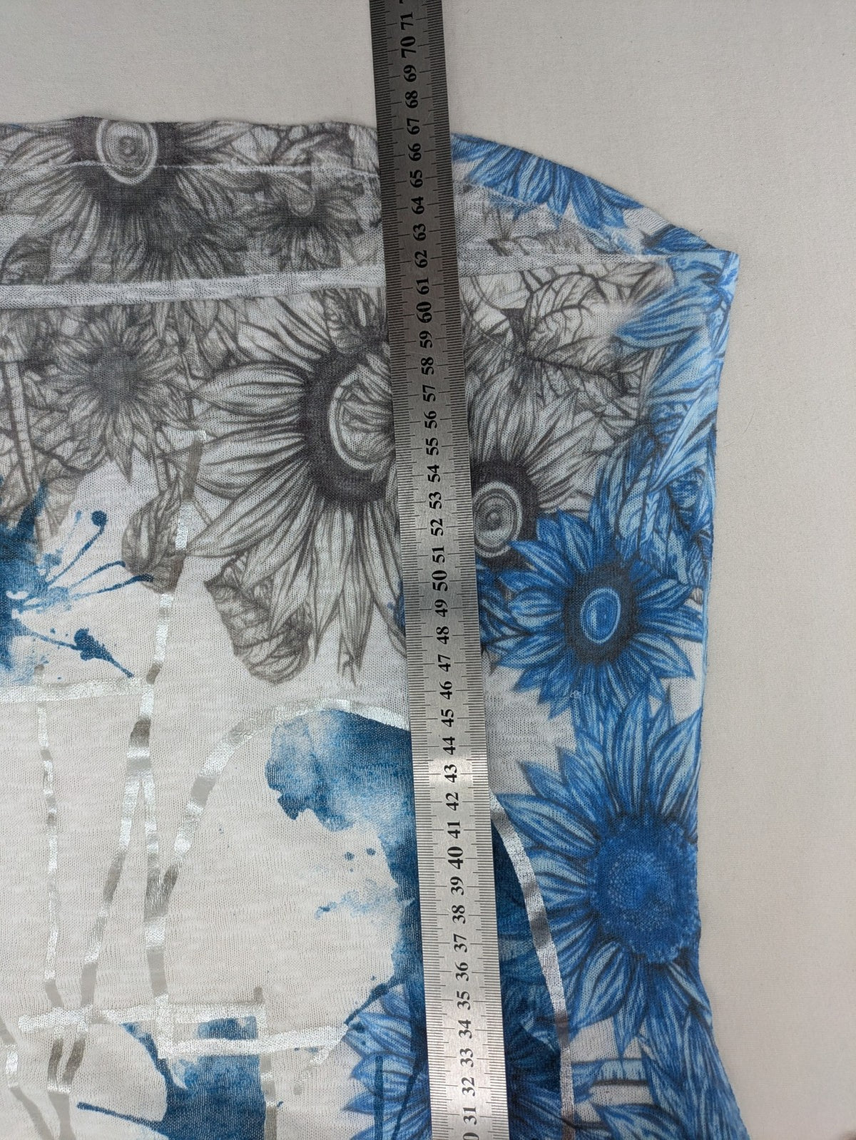 Liberty blue floral print top with metallic "LOVE" lettering, lightweight polyester material.