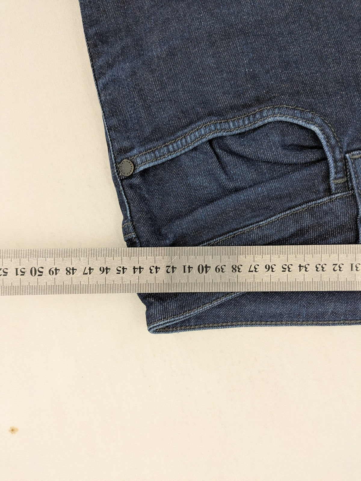 DISTRIKT NØRREBRO blue slim fit jeans with classic rinse wash and stretch denim material.