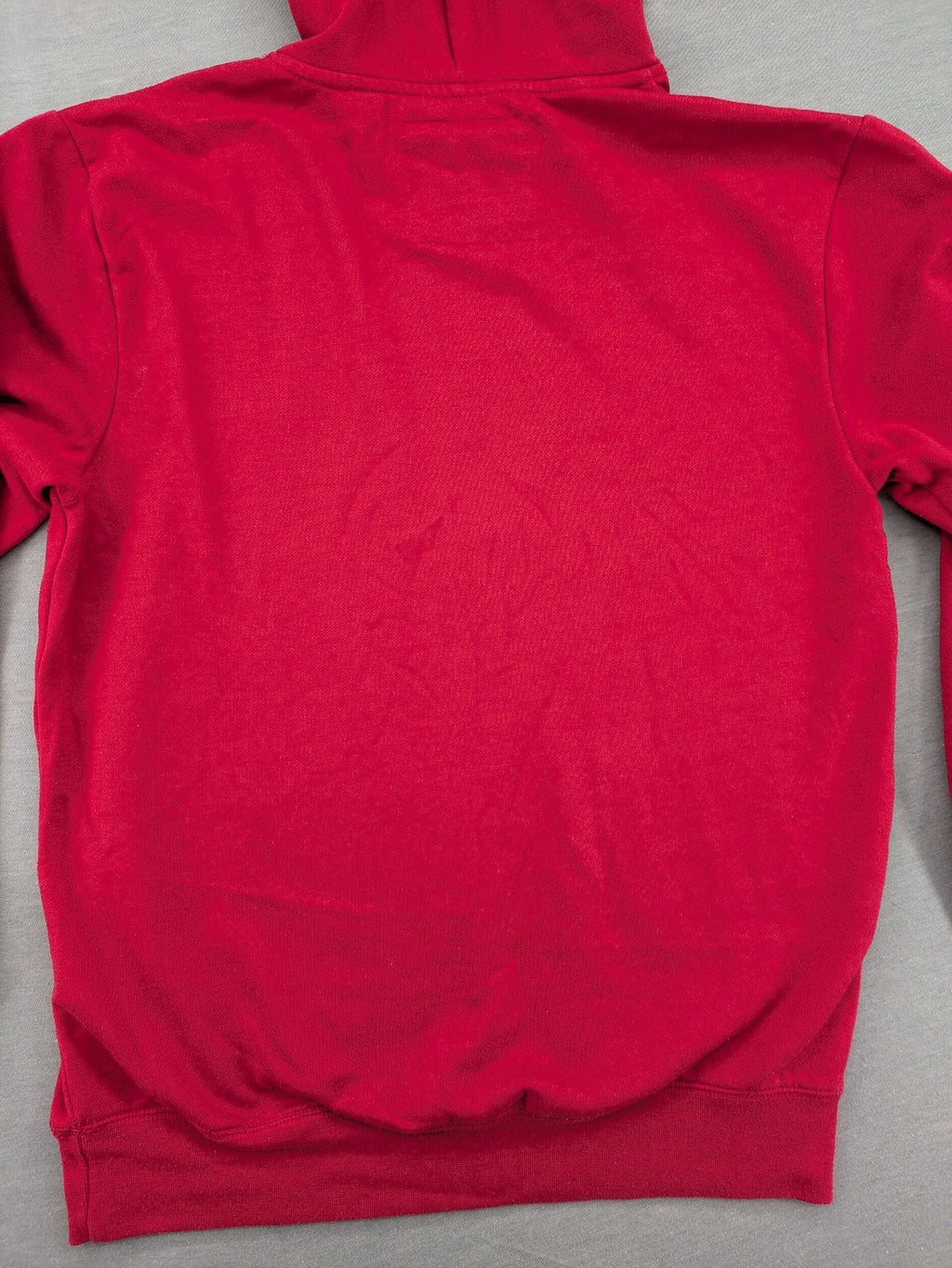 Sparks red zip-through hoodie with New York graphic print and grey hood.