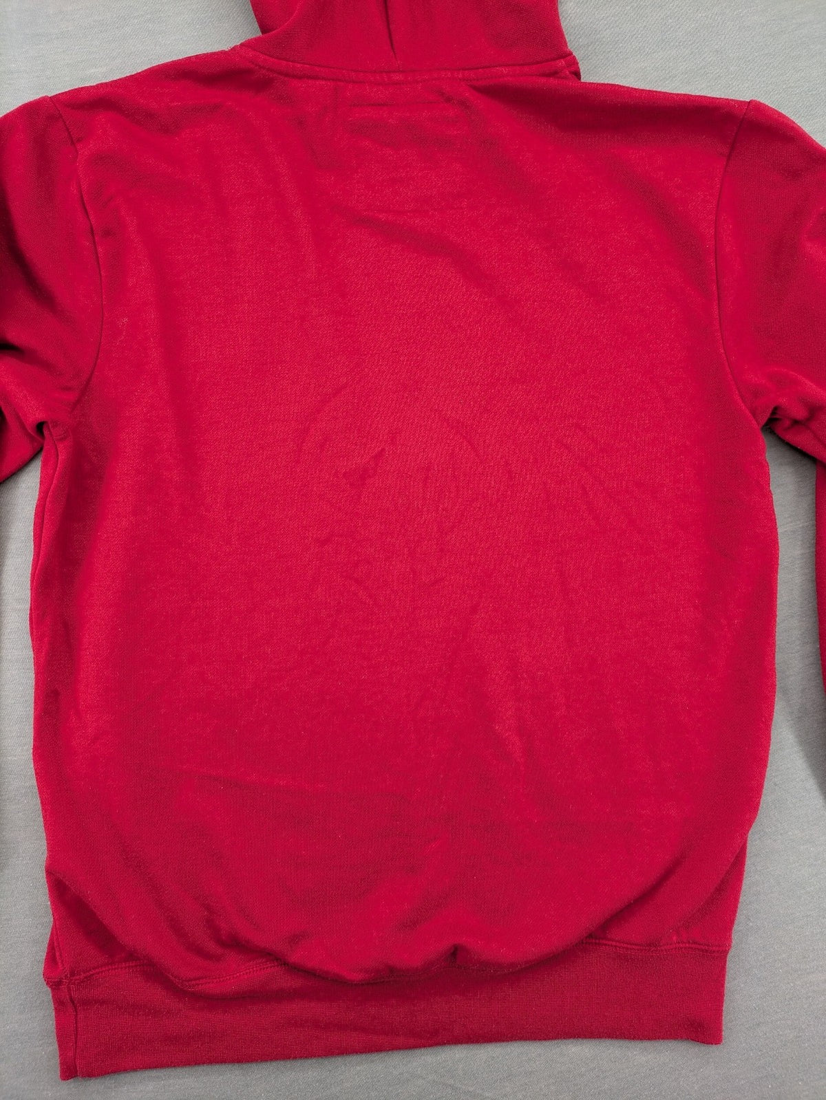 Sparks red zip-through hoodie with New York graphic print and grey hood.