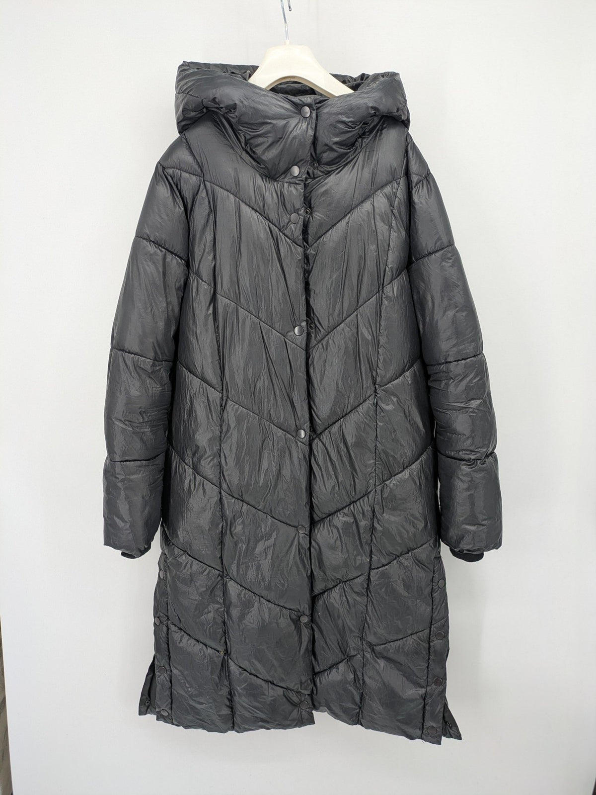 Stradivarius grey coat with chevron quilted pattern and hood, featuring zip closure and snap storm flap.