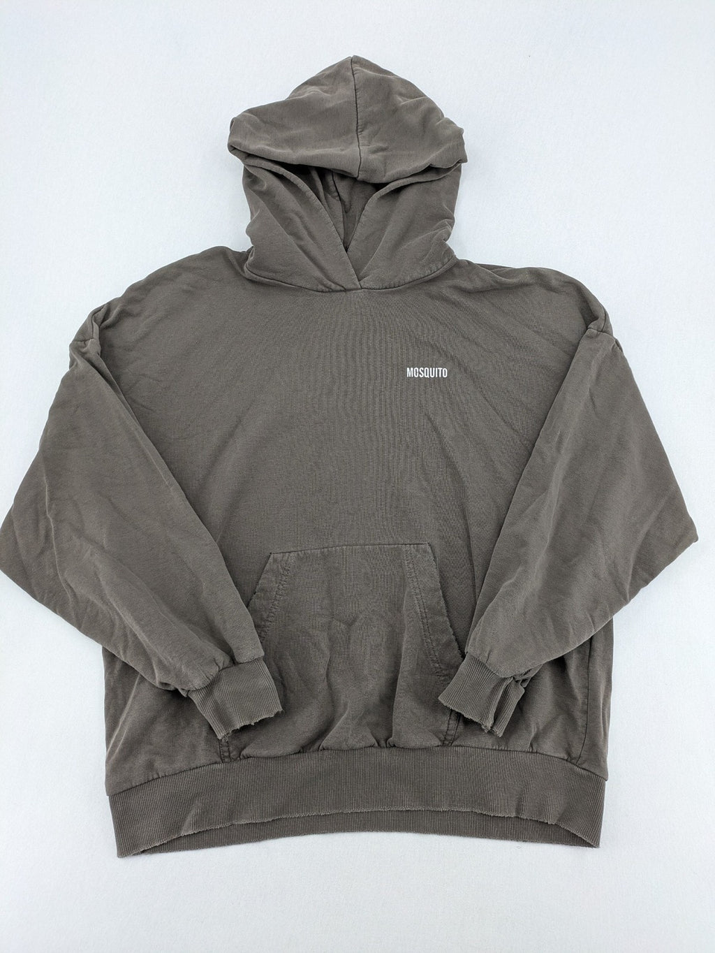 Mosquito grey hoodie with distressed cuffs and subtle logo on the chest.