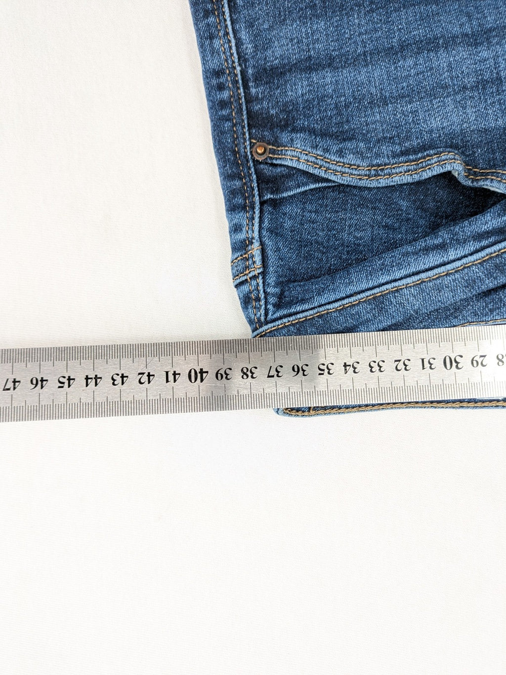 Esprit blue slim fit jeans with frayed hem and classic 5-pocket style.