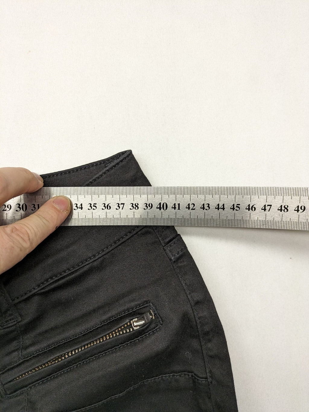 Colac black straight jeans high waist with double button, zipper pockets, and stretch material.