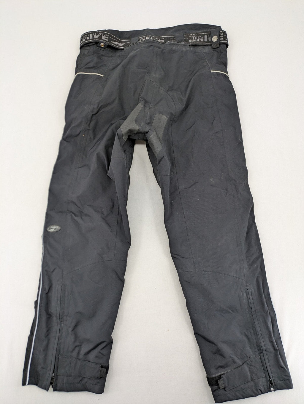 Polo black chaps with grey and white accents, featuring protective knee pads and adjustable belt.