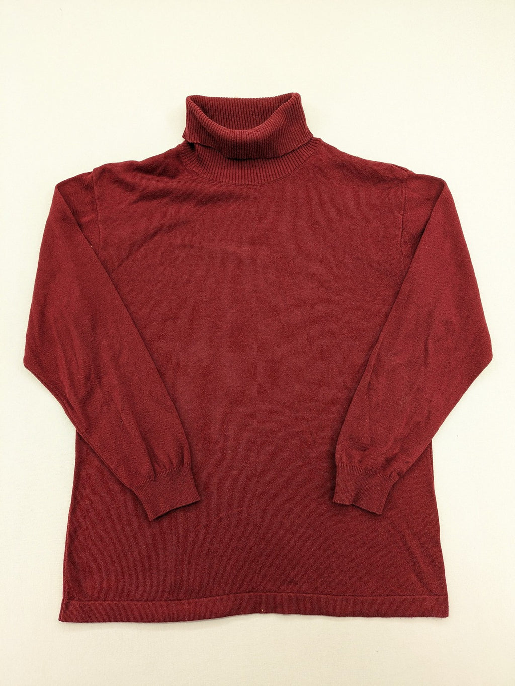 Les Corps burgundy turtle neck jumper with ribbed details and soft cotton blend material.