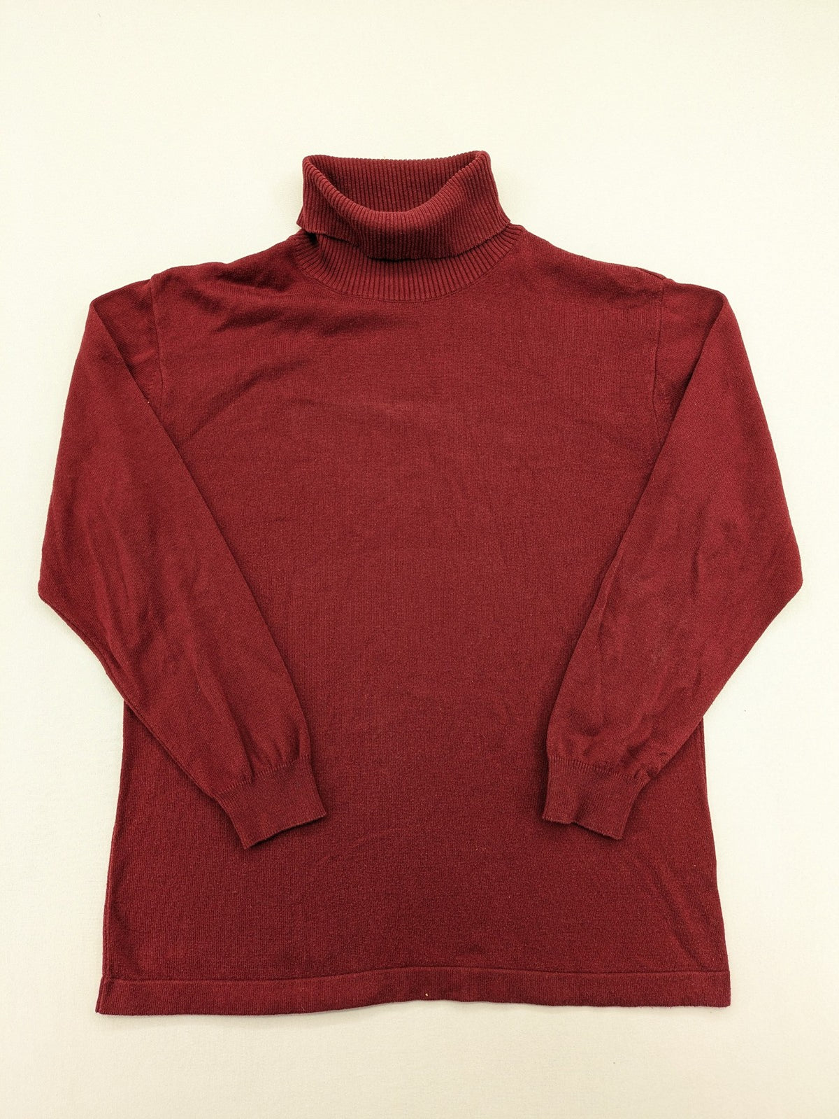 Les Corps burgundy turtle neck jumper with ribbed details and soft cotton blend material.