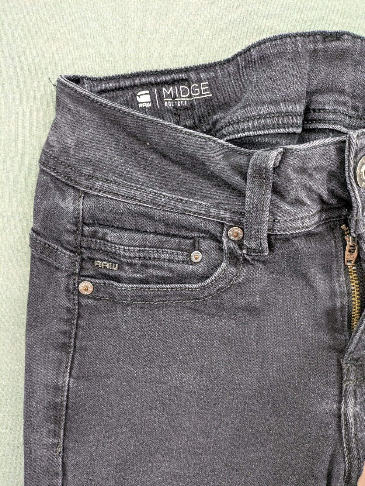 G-Star Raw grey straight jeans with 5-pocket design and logo detailing.