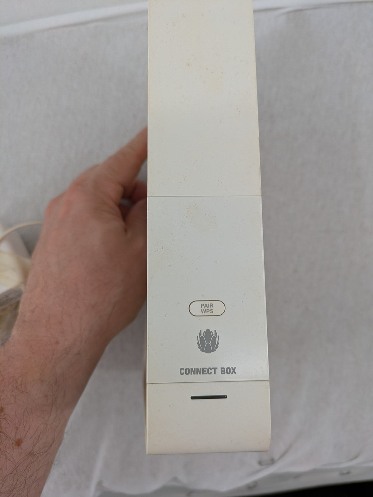 Compal beige WLAN modem router with integrated Wi-Fi and multiple LAN ports.