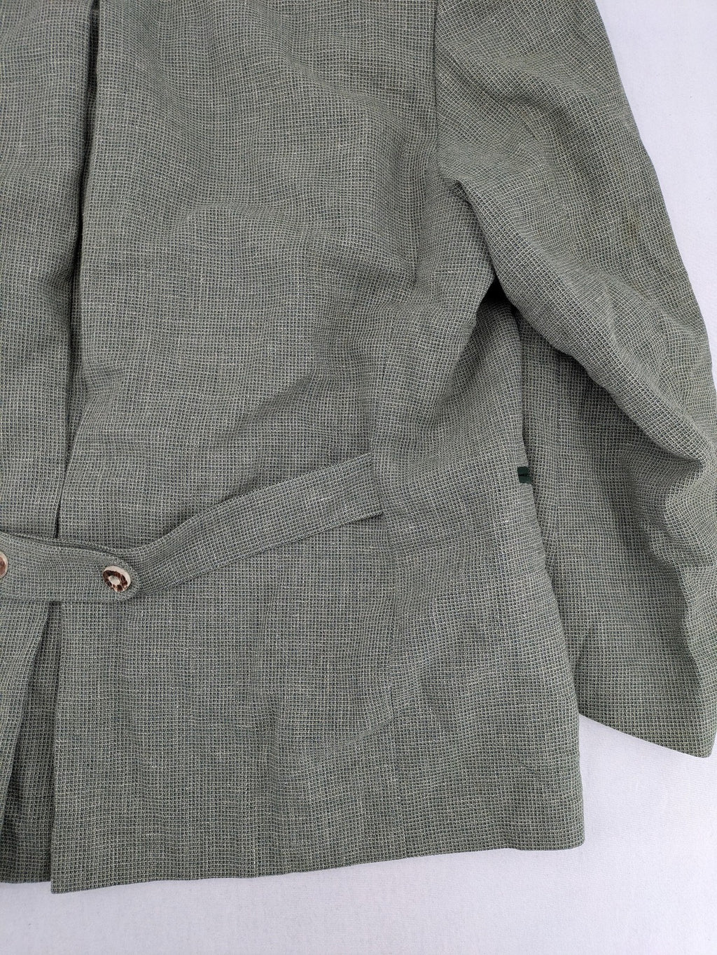 Traunsee Trachten green jacket with standing collar, decorative buttons, and premium wool-linen blend.