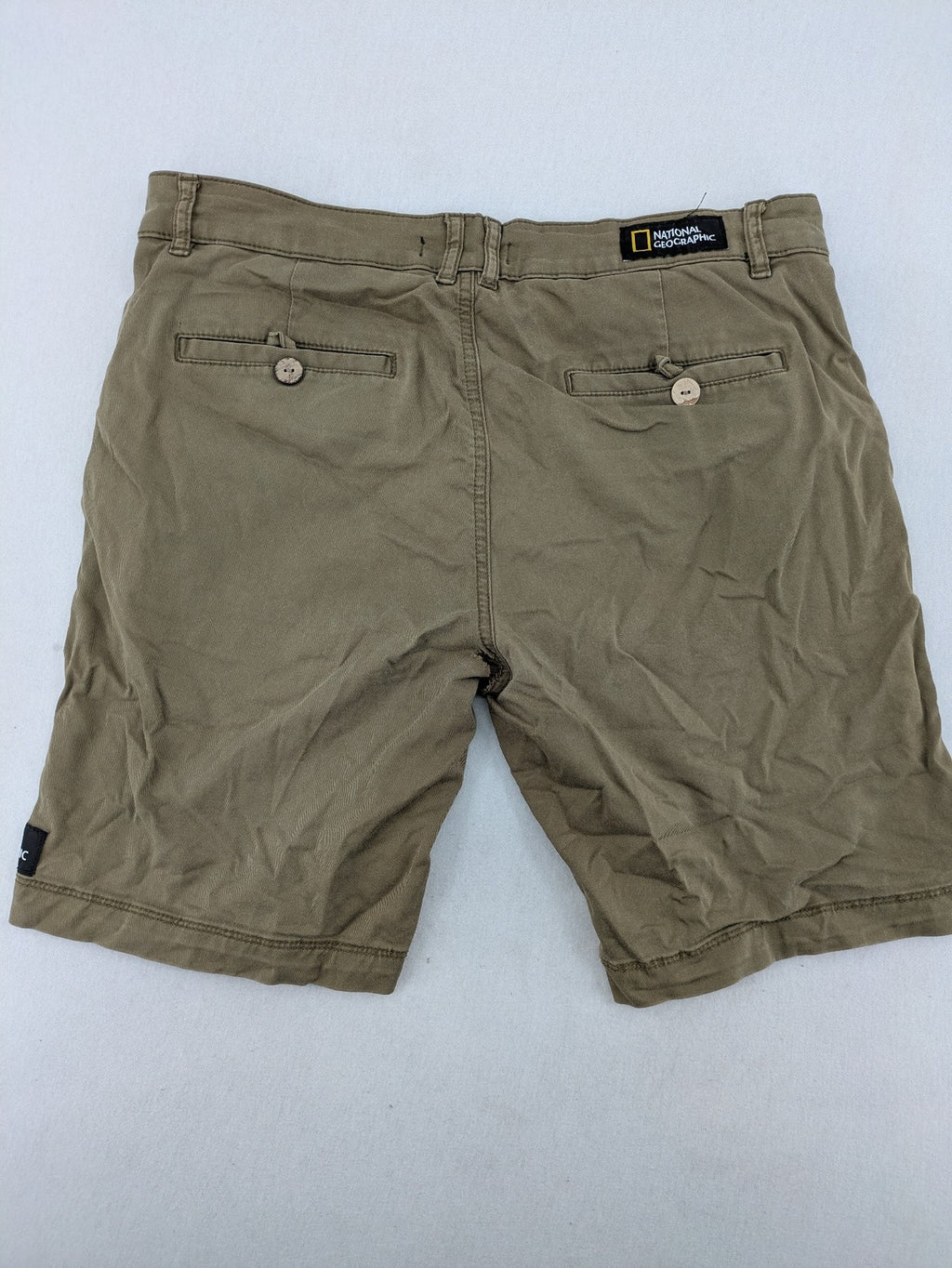 National Geographic khaki shorts flat front design with subtle logo patch