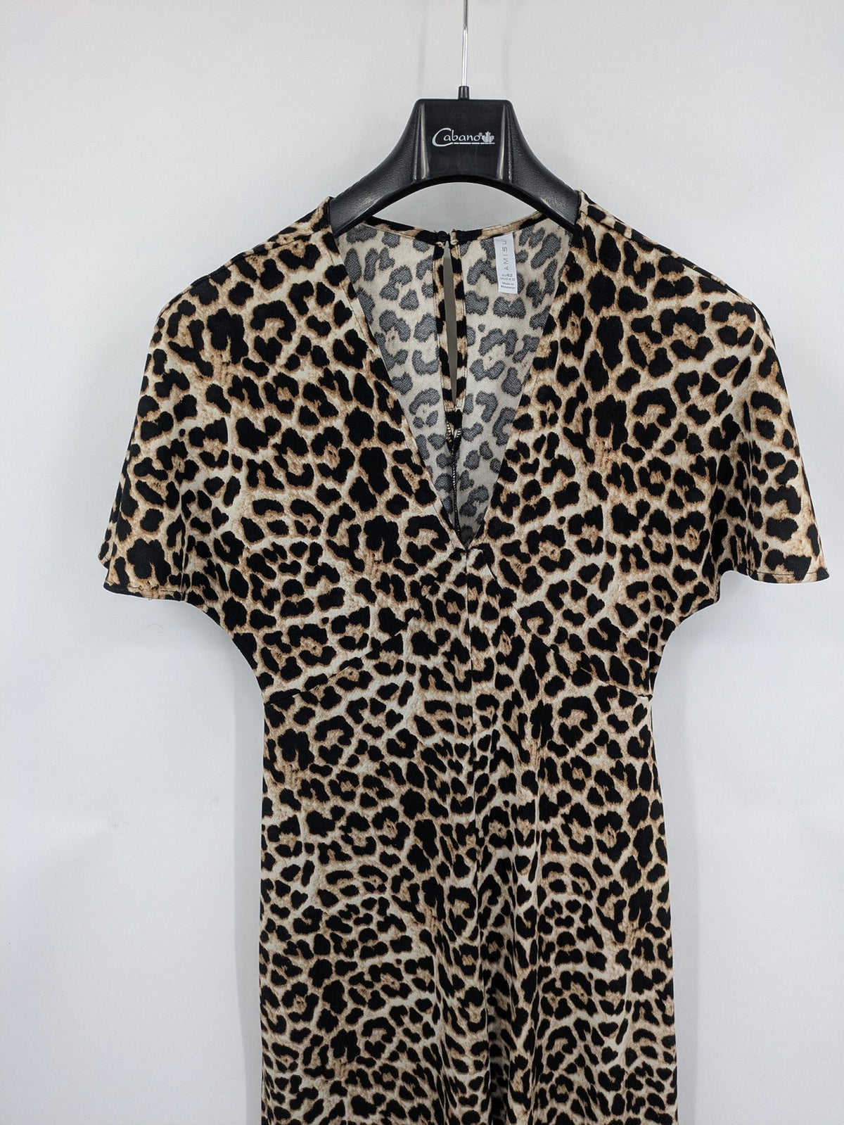 Amisu beige jumpsuit leopard print V-neck, short sleeves, keyhole back detail.
