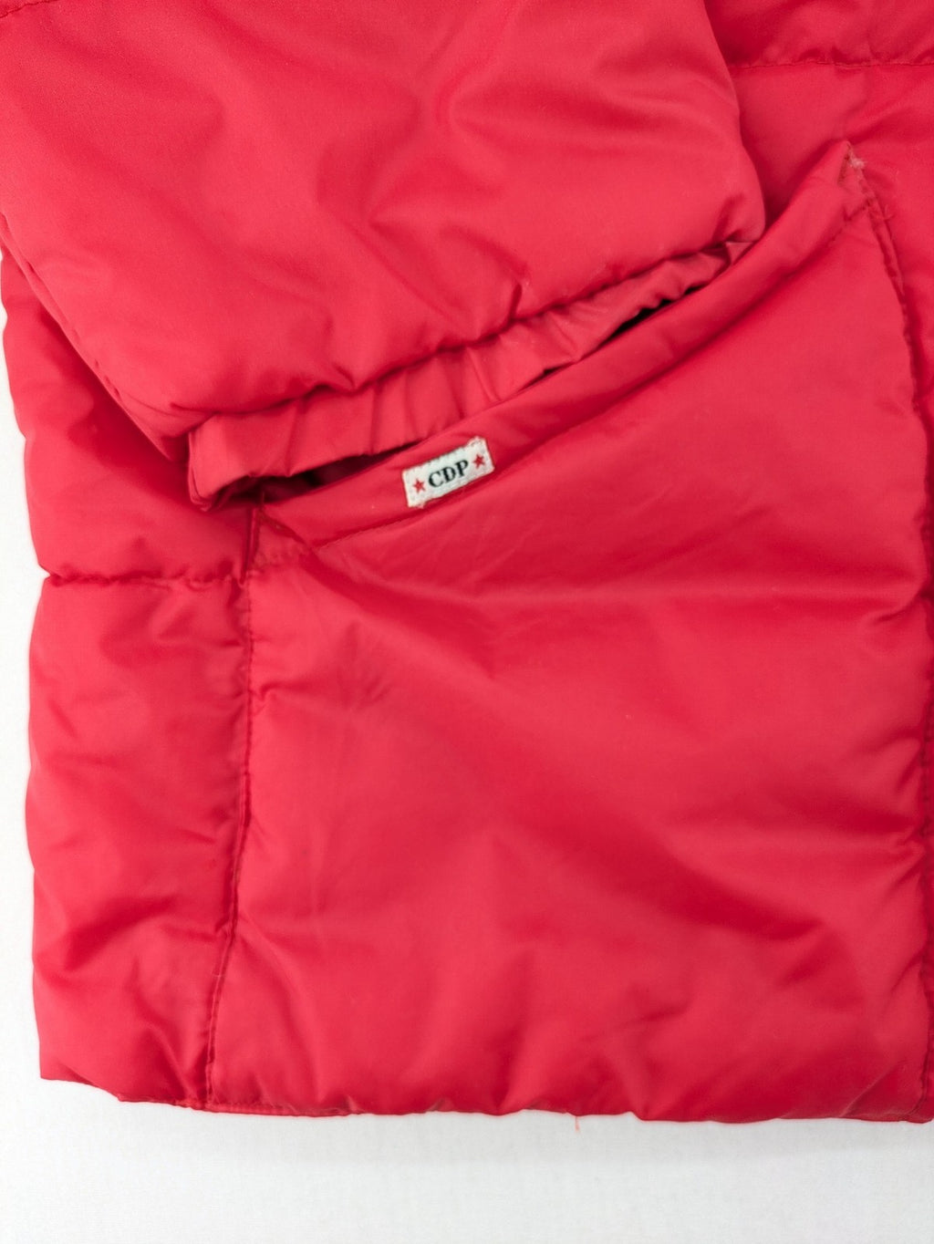 Rox red puffer vest with detachable sleeves and hood, vintage style.