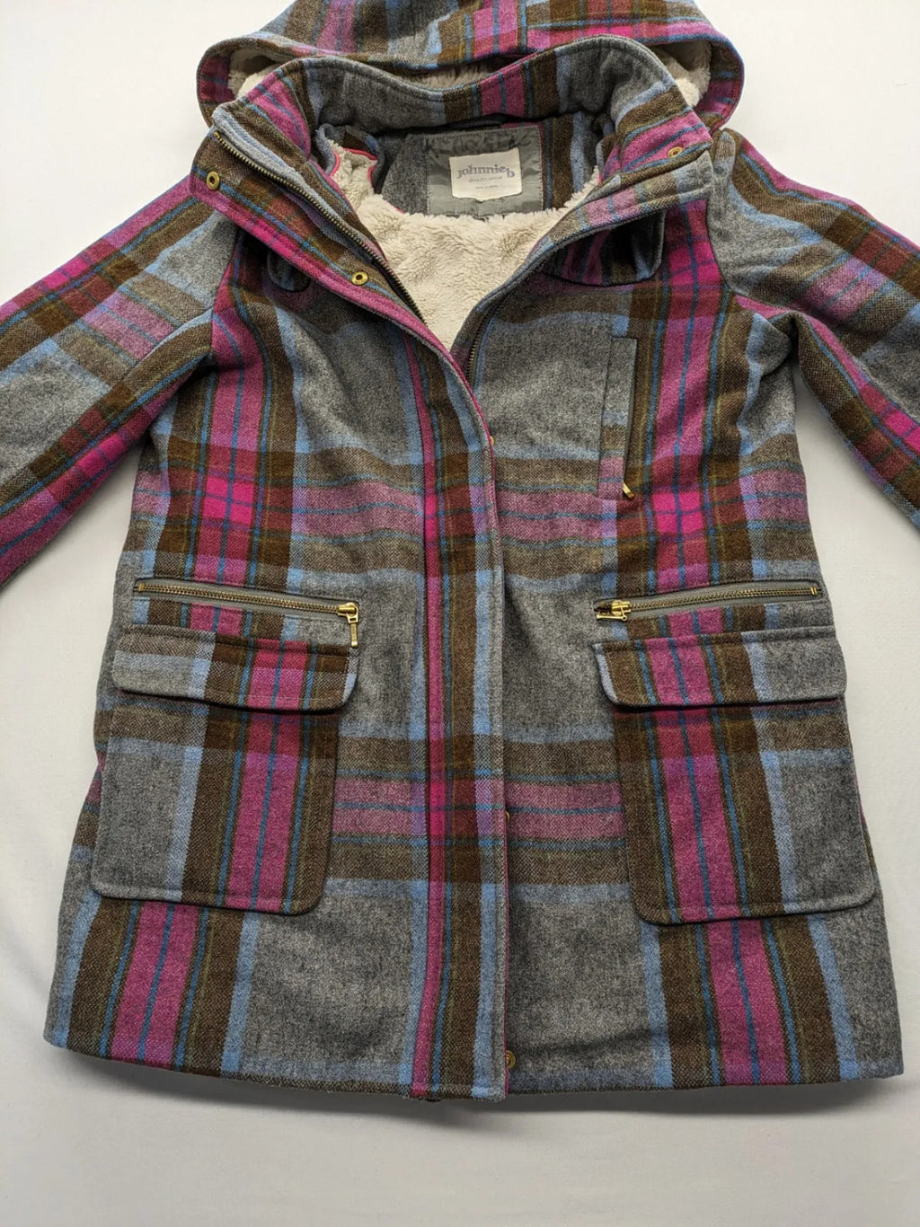Johnnie B pink coat with gray check pattern, Sherpa lining, and zip closure.