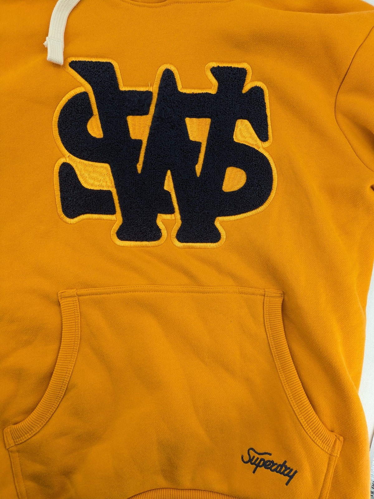 Superdry orange turtle neck jumper with textured logo patch and number 7 detail.