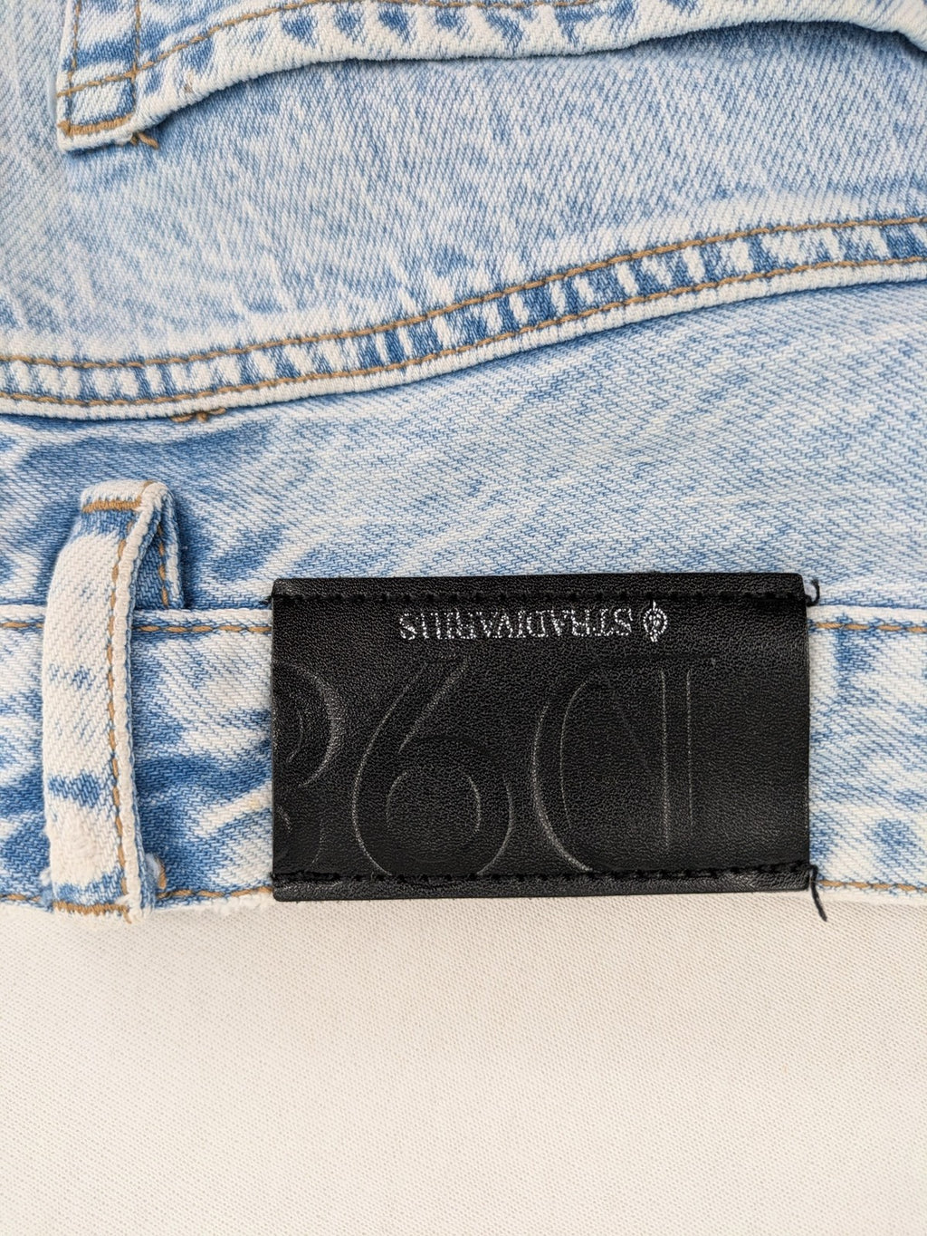 Stradivarius blue high waist flare jeans with acid wash and classic five-pocket design.