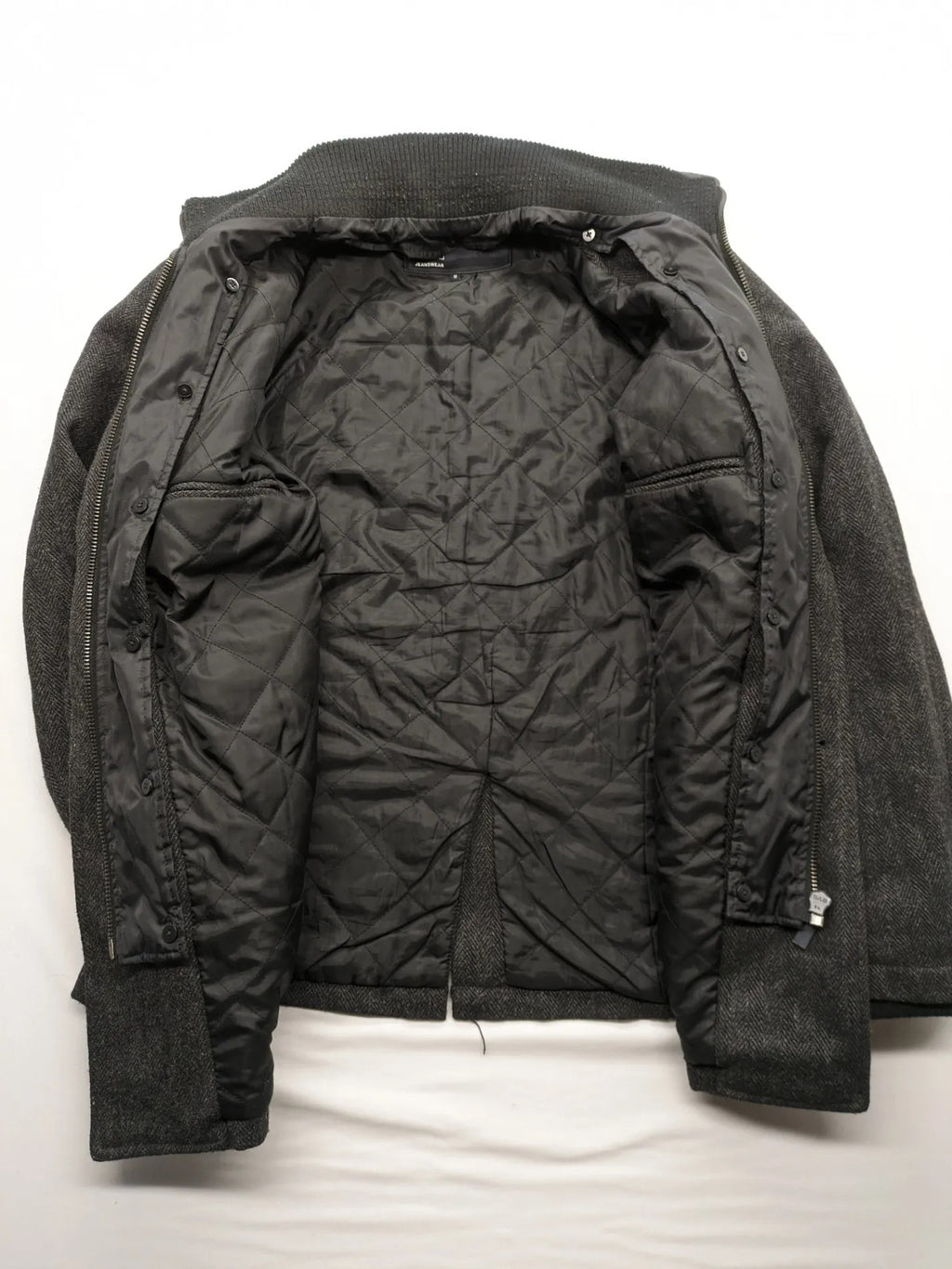 Jack & Jones grey coat herringbone pattern with two-button closure and side pockets.