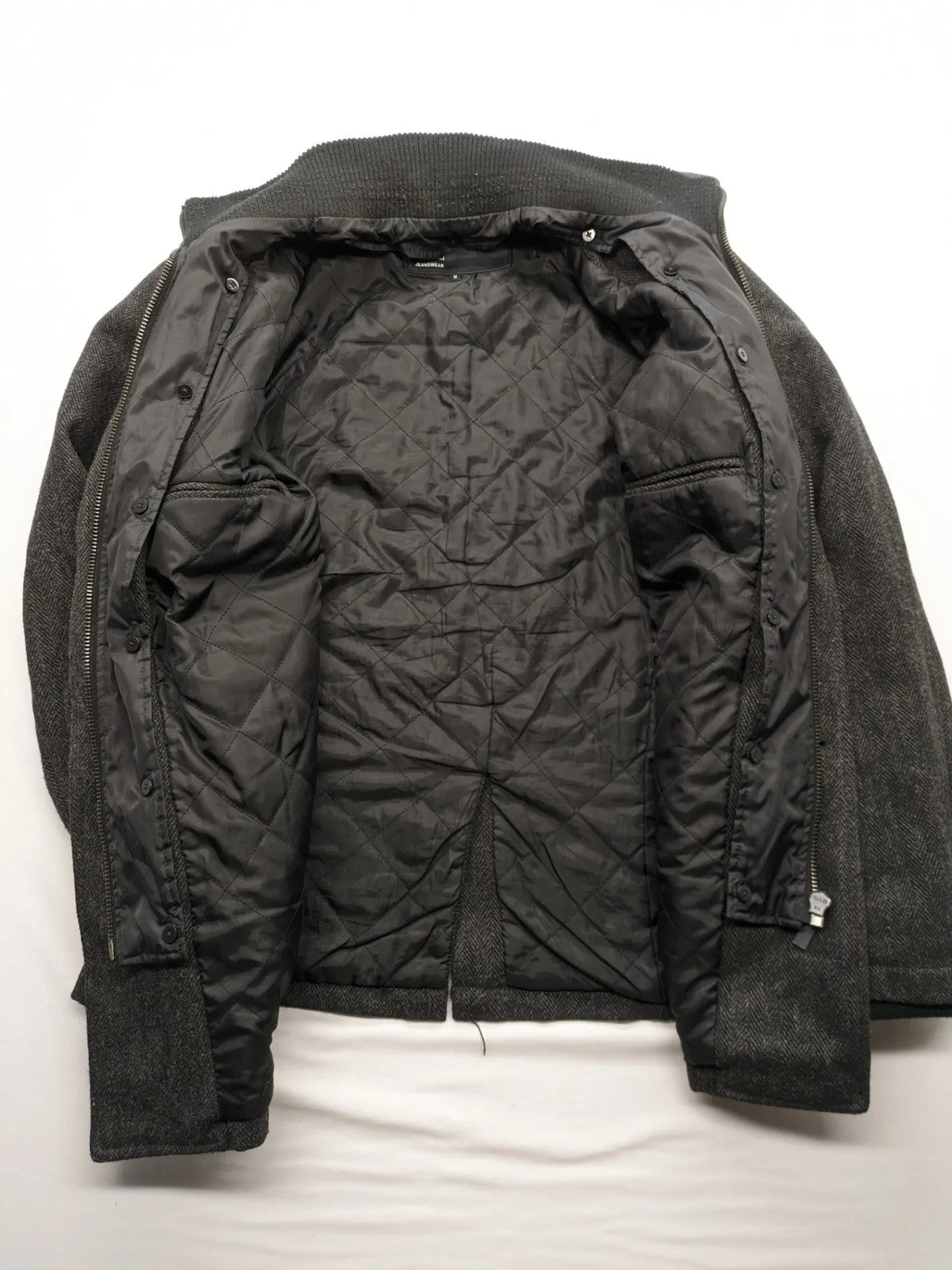 Jack & Jones grey coat herringbone pattern with two-button closure and side pockets.