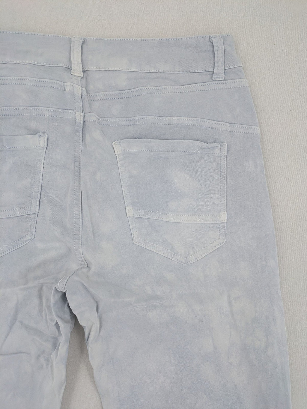 Yelly&Co blue and white batik pants with button fly, made from soft stretch fabric.