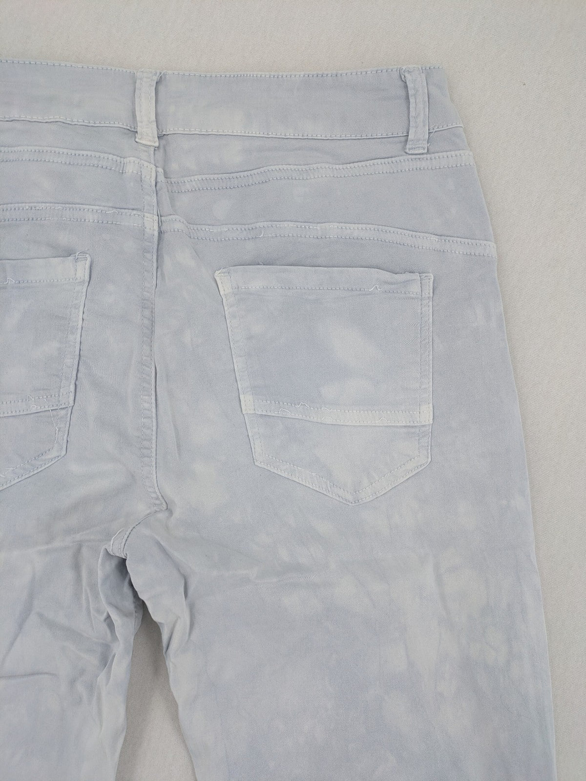 Yelly&Co blue and white batik pants with button fly, made from soft stretch fabric.