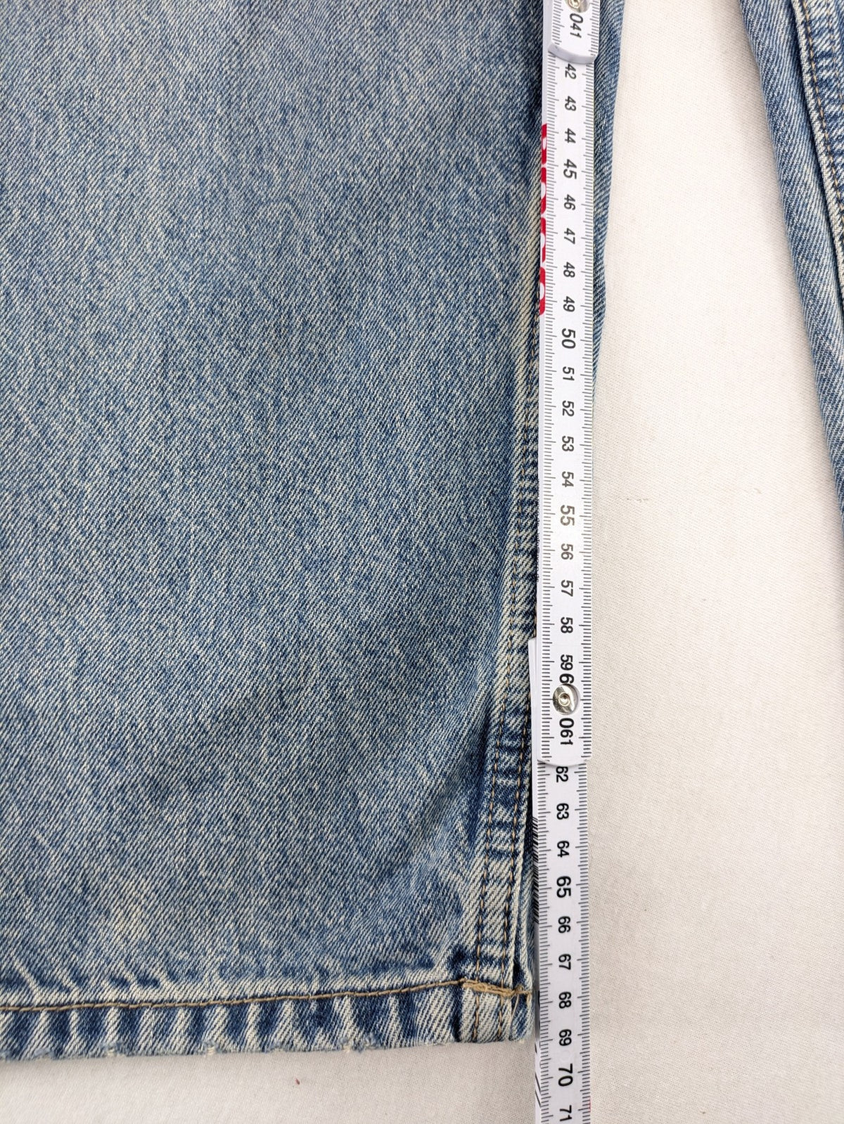 Bershka blue wide leg jeans high waist baggy style with light wash and cotton material.