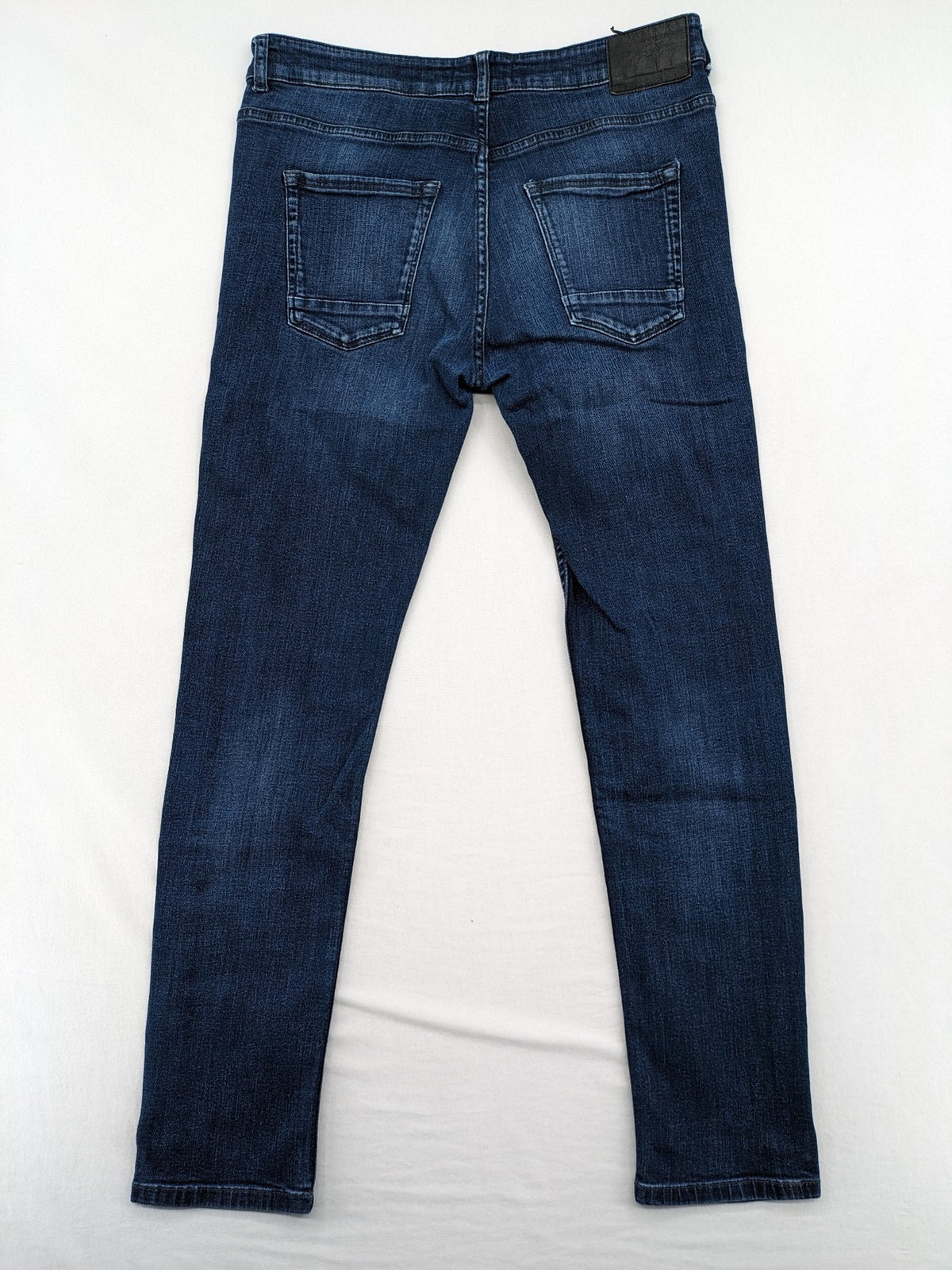 Clockhouse blue skinny fit jeans with stretch material and subtle logo detail.