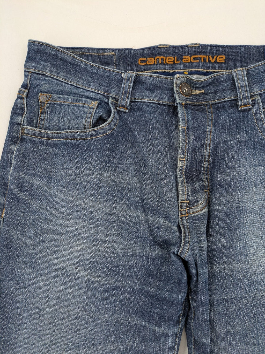 Camel Active blue straight jeans with classic 5-pocket design and logo patch.
