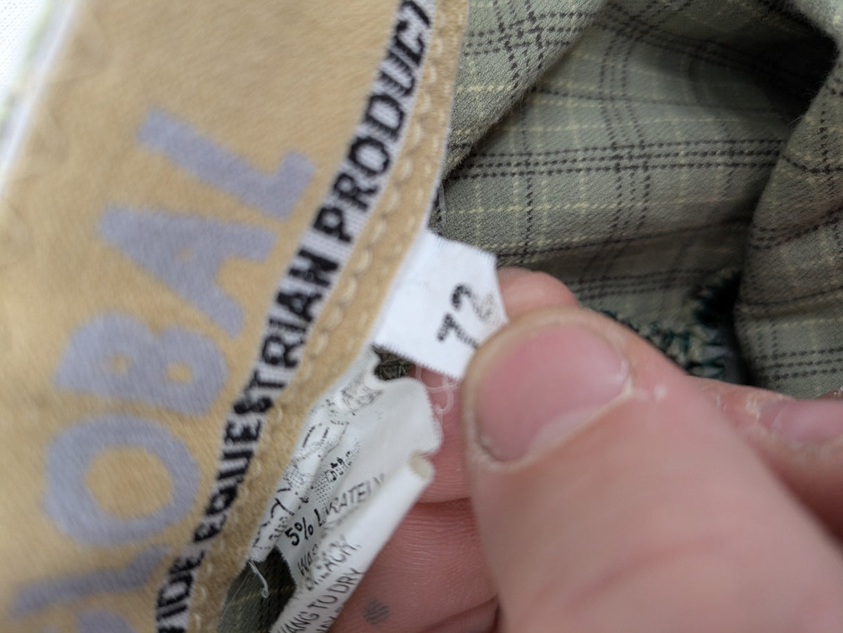 Jodhpur beige and grey riding pants with green check pattern and knee patches.