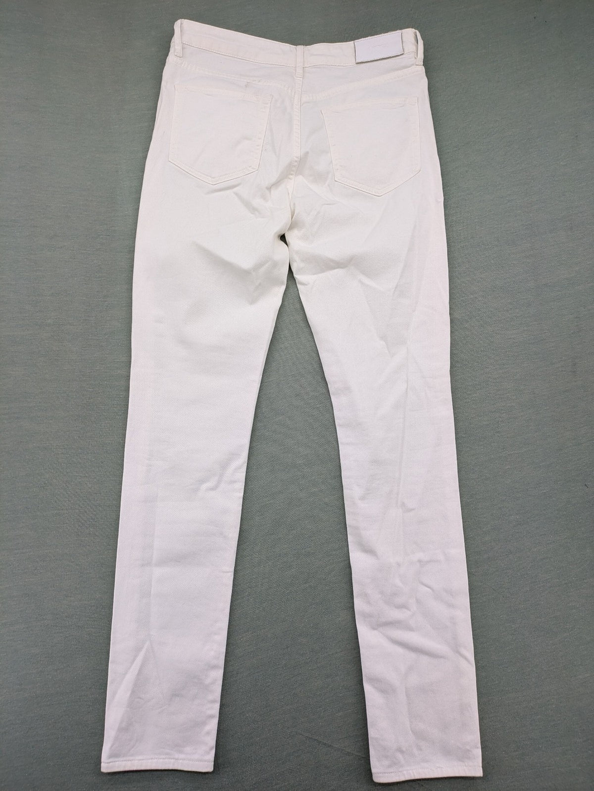 Lacoste white straight jeans high rise slim fit with logo and stretch denim material.