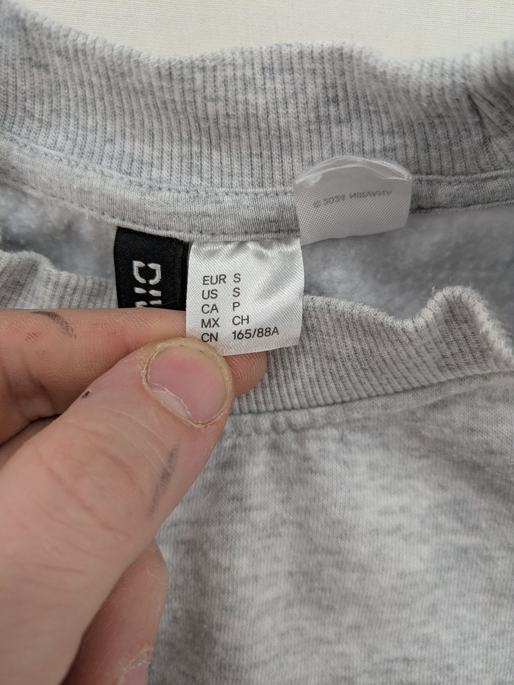 H&M Divided grey turtle neck jumper featuring Nirvana "In Utero" angel graphic.