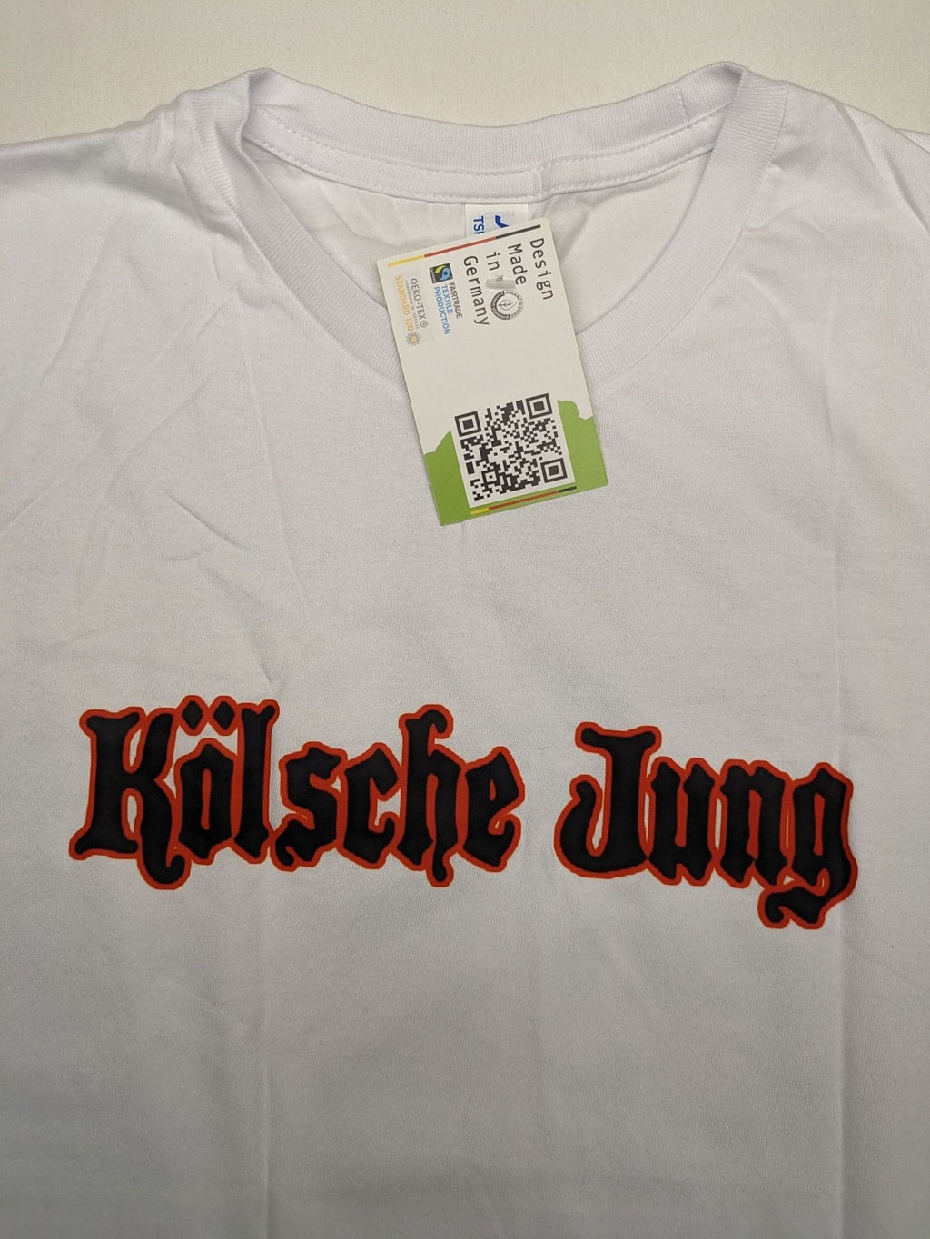 JHK black t-shirt with red "Kölsche Jung" text and Cologne Cathedral graphic.