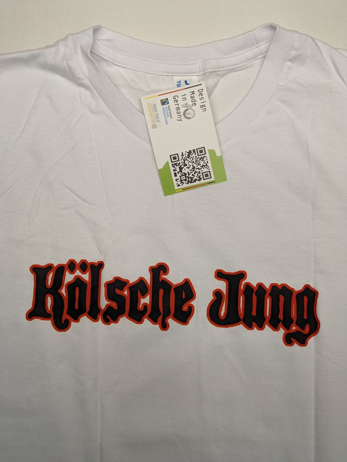 JHK black t-shirt with red "Kölsche Jung" text and Cologne Cathedral graphic.