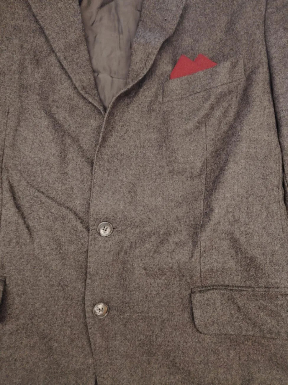 Adler pink two-piece suit, classic two-button design, luxurious wool-cashmere blend.