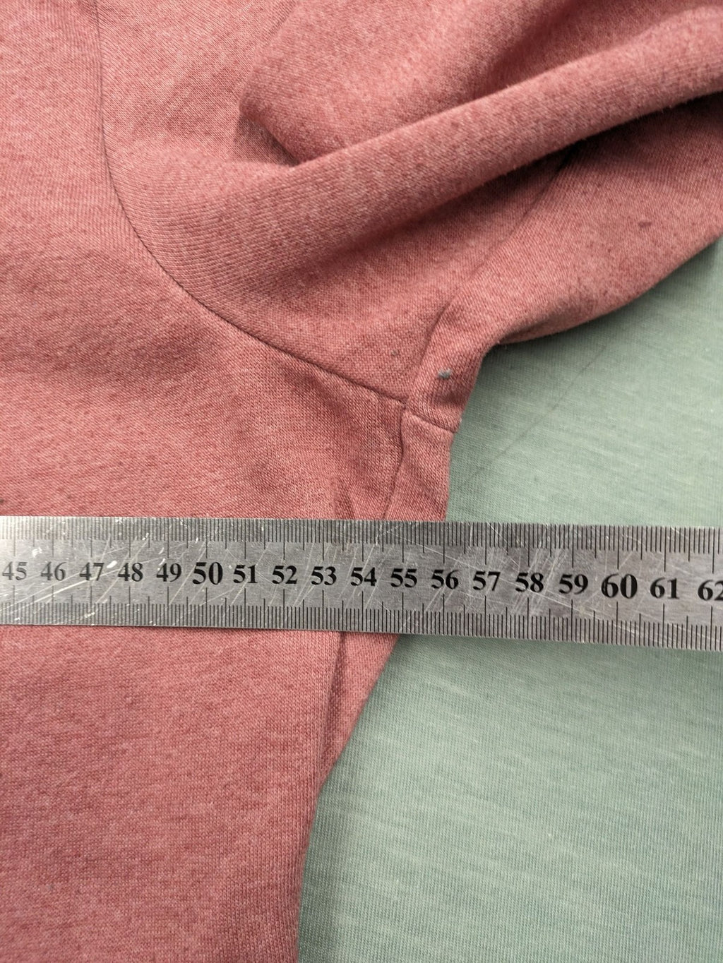 ONLY pink zip-through hoodie with hood, front zipper, and two pockets.