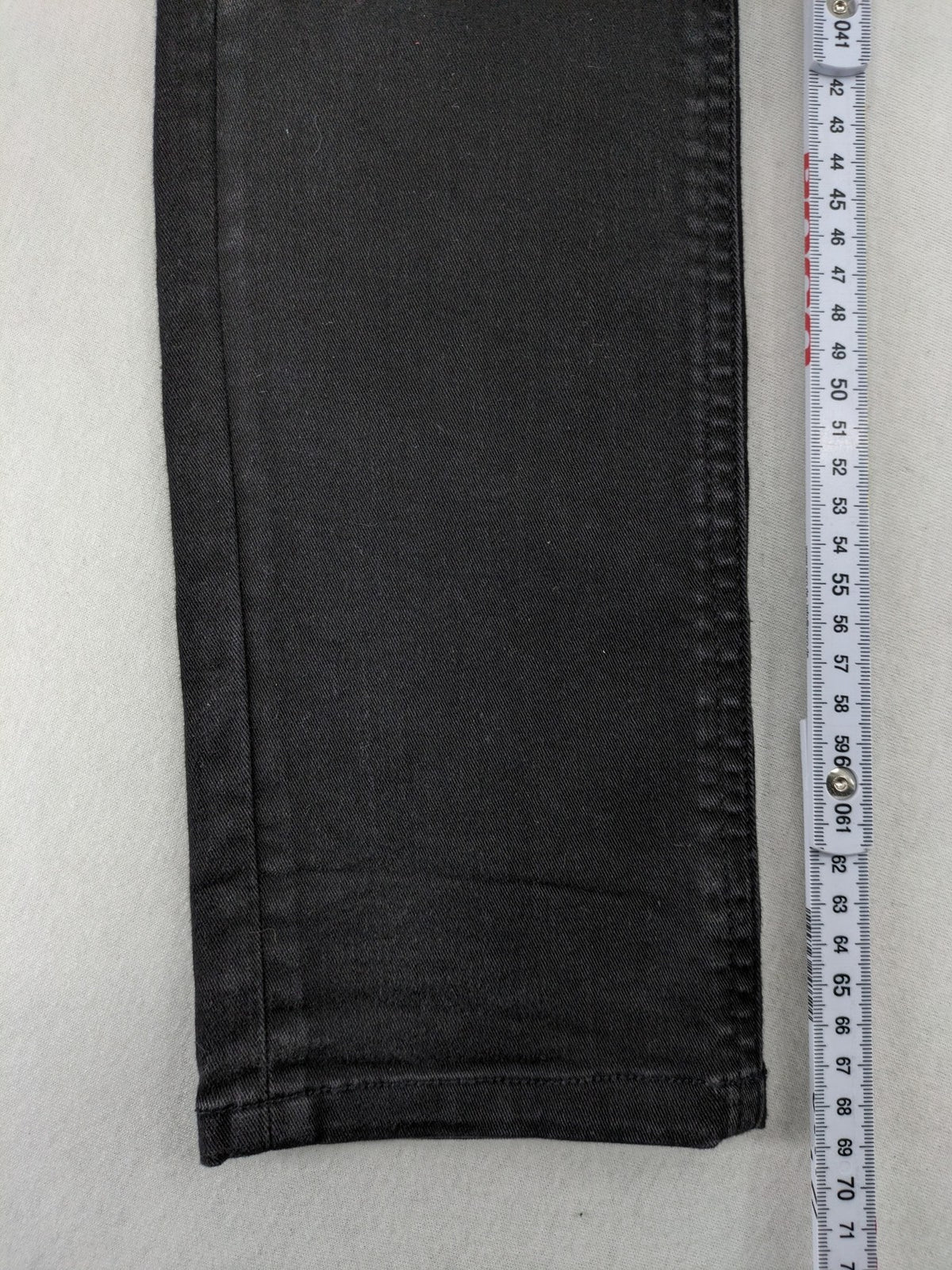 Kaporal black slim fit jeans with classic 5-pocket design and stretch denim material.