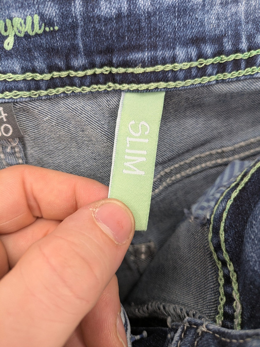 Multiblu blue straight jeans slim fit with decorative front zippers and light wash.