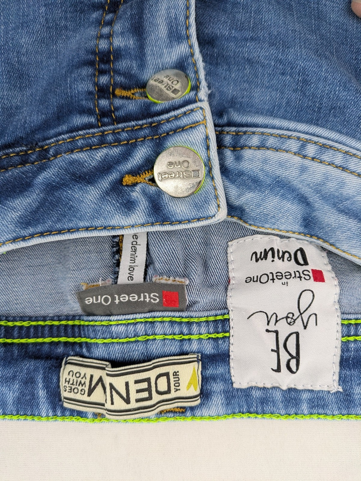Street One blue straight jeans with green patterned cuffs and button fly detail.
