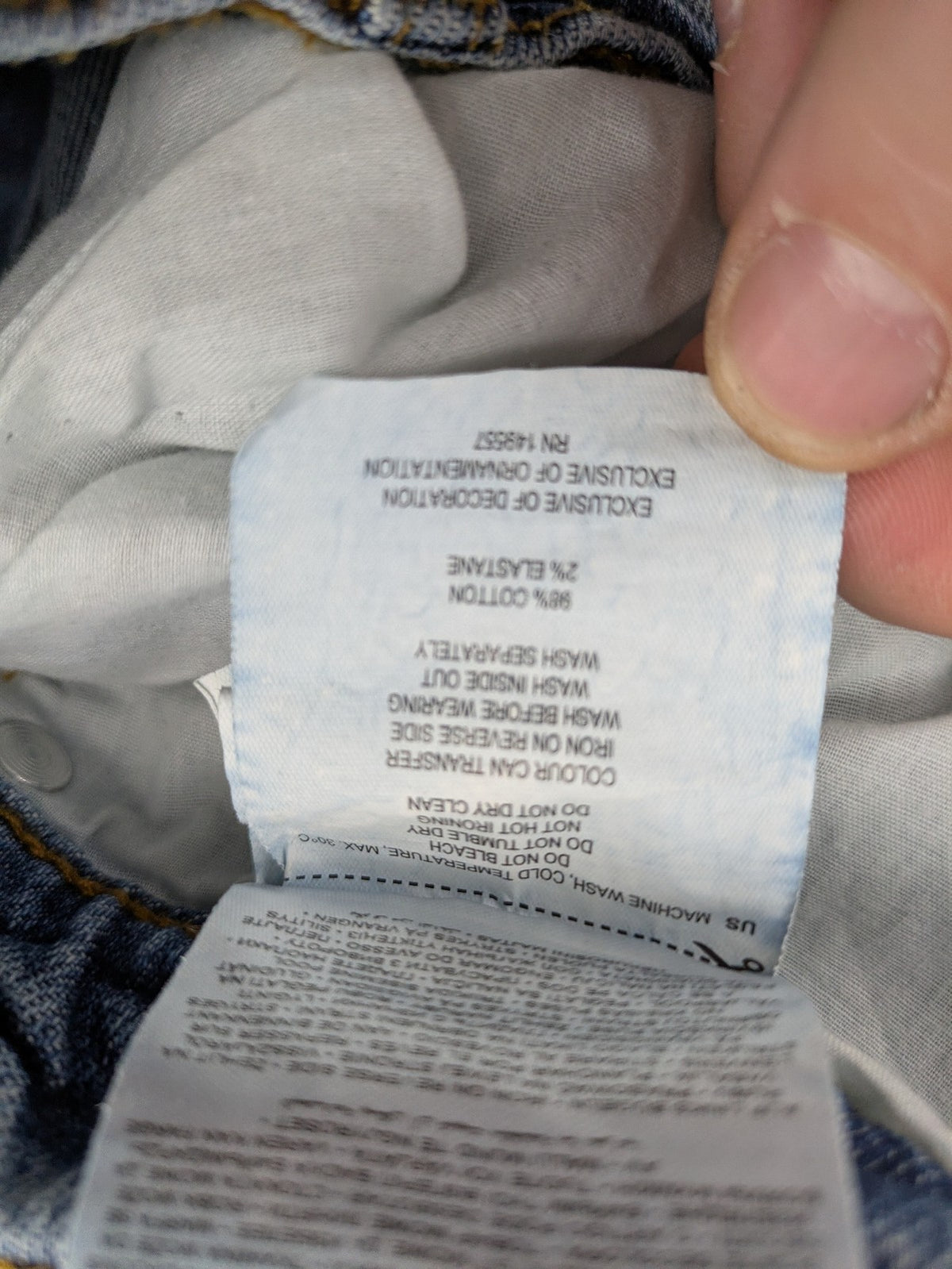 FSBN blue straight jeans with ripped distressed knees and classic button fly.