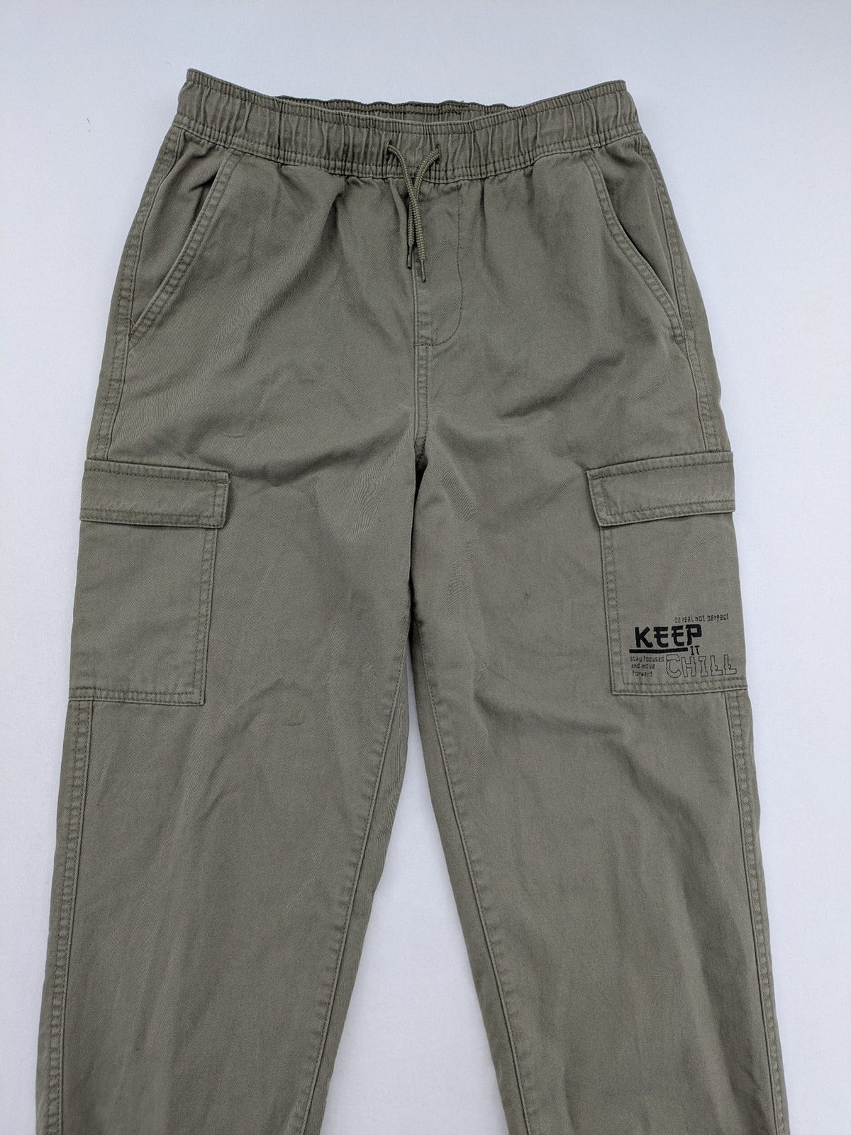 Y.F.K. khaki cargo pants with elastic cuffs, side pockets, and drawstring waistband.
