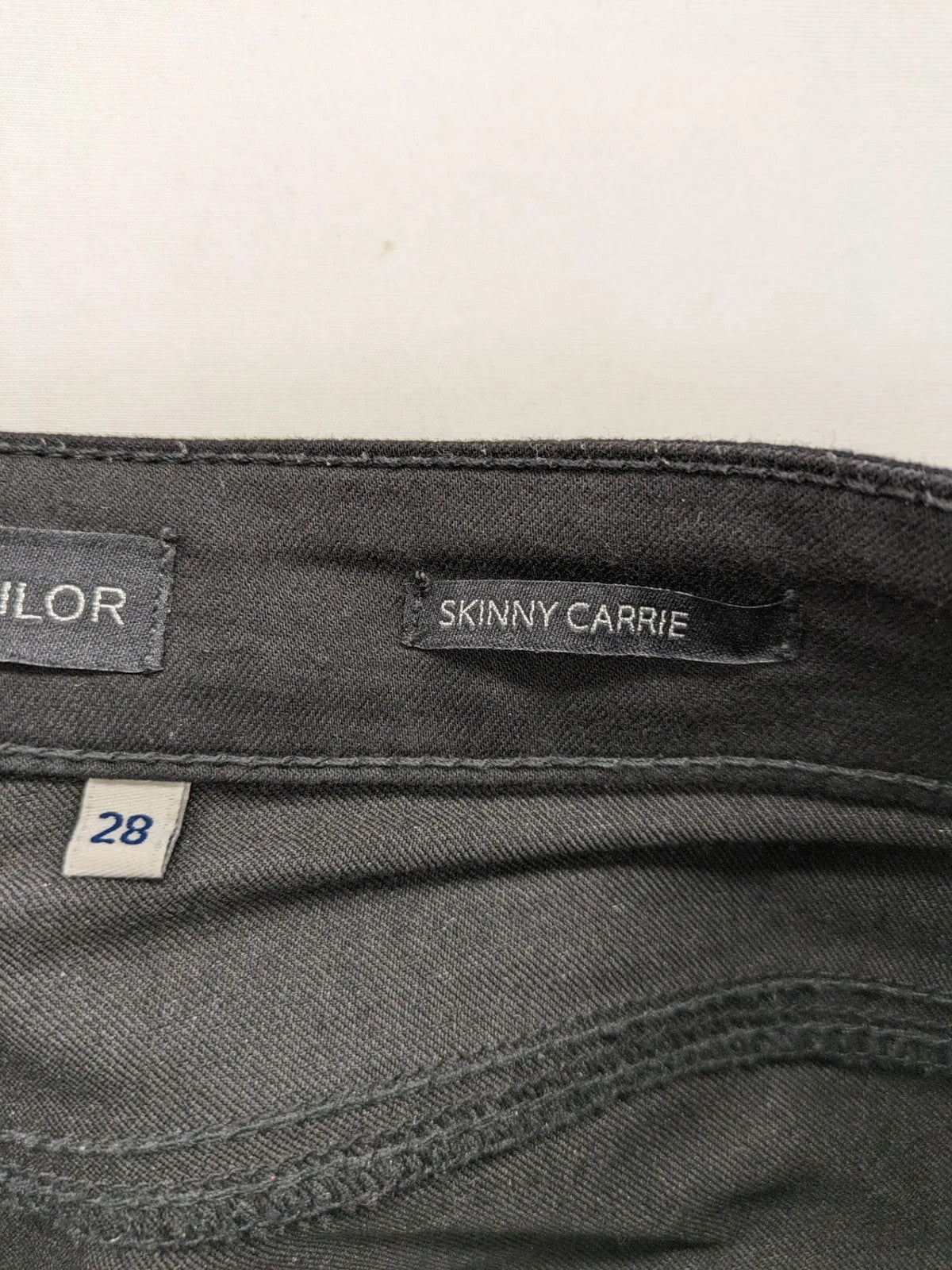 Tom Tailor black and grey skinny jeans with snake print and ankle zippers.