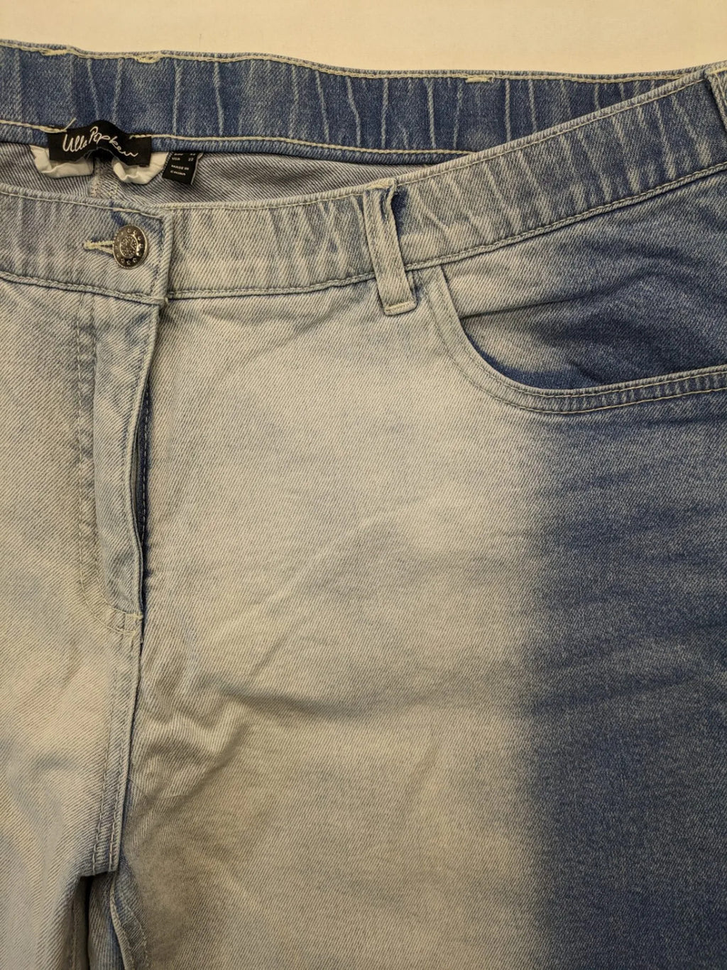 Ulla Popken blue straight jeans with used look, elastic waistband, and 5-pocket style.