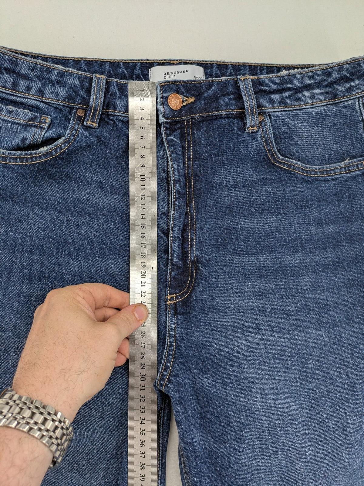 Reserved blue straight jeans high waist with classic fit and stretch cotton material.