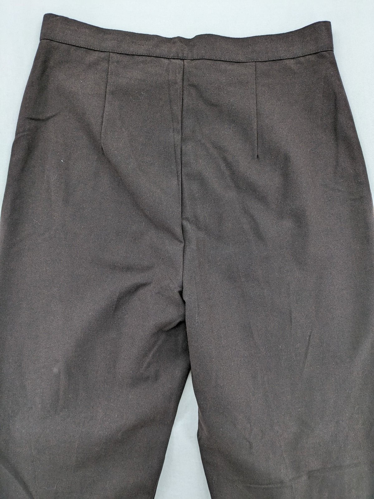 öGS Collection pink high waist pants with front pleats and structured fit.