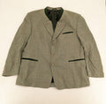 Traunsee Trachten green jacket with standing collar, decorative buttons, and premium wool-linen blend.