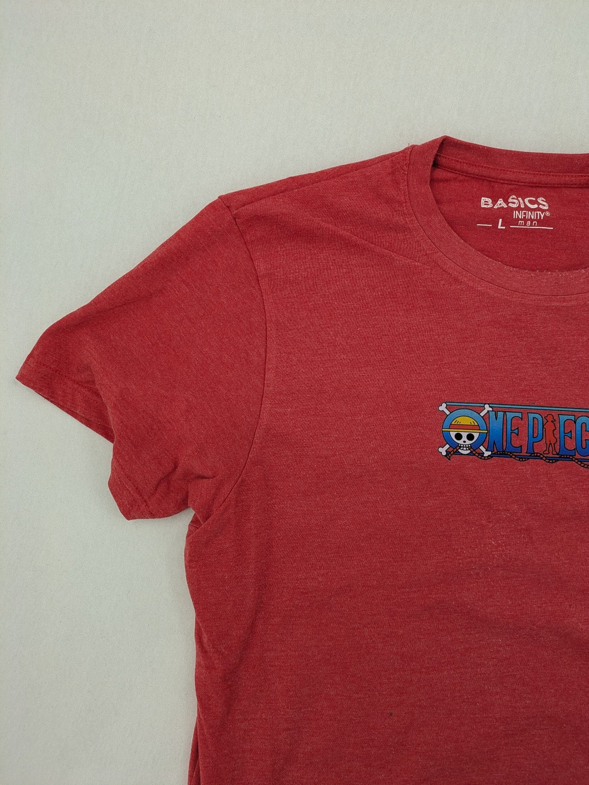 One Piece band t-shirt red melange with prominent logo graphic on chest.