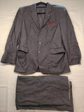 Adler pink two-piece suit, classic two-button design, luxurious wool-cashmere blend.