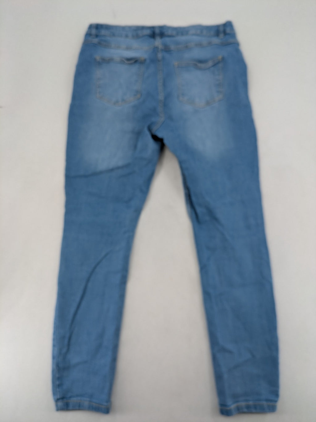 Janina blue skinny fit jeggings with elastic waistband and angled front pockets.