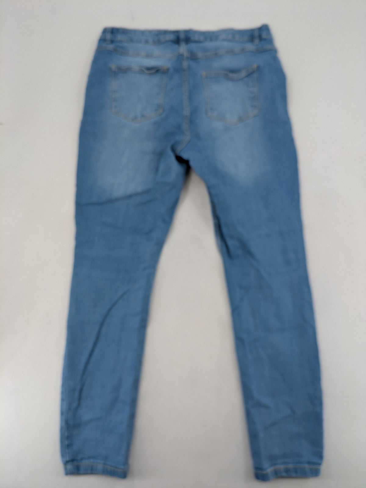 Janina blue skinny fit jeggings with elastic waistband and angled front pockets.