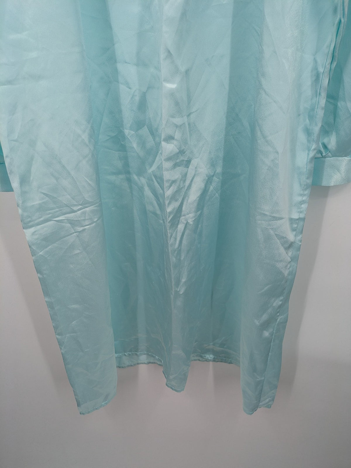Linea blue vintage nightgown satin fabric with embroidered floral lace collar and ruffles.